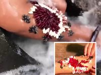 太驚悚！河中抓魚遇「怪異生物狂附身」，男子拼命甩水卻無法脫身「網細看傻眼」：小心截肢